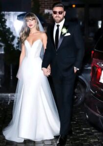 JUST IN: Travis Kelce and his Fiancee Taylor Swift Stuns The World as They Officially Tie the Knot in Kansas Dressed in Their Expensive Wedding Outfits… SEE 13 PHOTOS