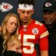 😢 Patrick Mahomes’ Devastating Family Announcement Silences Arrowhead — A Day Kansas City Will Never Forget In a moment no one saw coming, the face of the Kansas City Chiefs, Patrick Mahomes, stood alongside his family to share a heartbreaking announcement that sent shockwaves through the NFL community. Players, coaches, and fans alike were left speechless, many overcome with emotion as the reality of the news began to sink in. What could possibly shake the Chiefs Kingdom so deeply? This emotional bombshell has left millions searching for answers — and the football world may never be the same again…" See full article 👇 👇